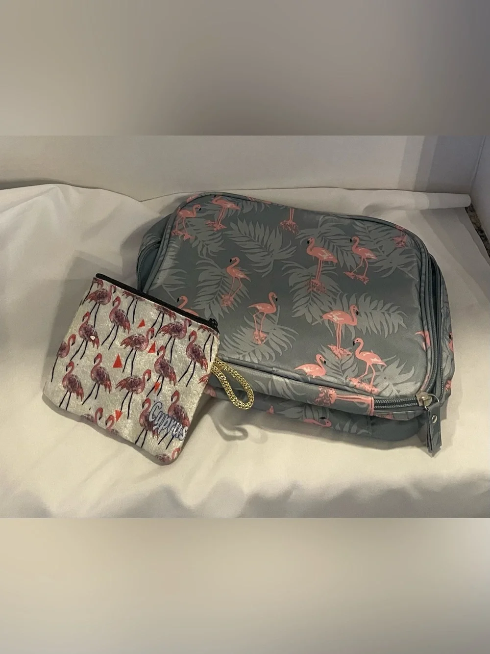 Flamingo print travel toiletry/cosmetic bag + matching small wristlet pouch set.